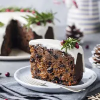 ilustrasi christmas cake/Anna_Pustynnikova/Shutterstock