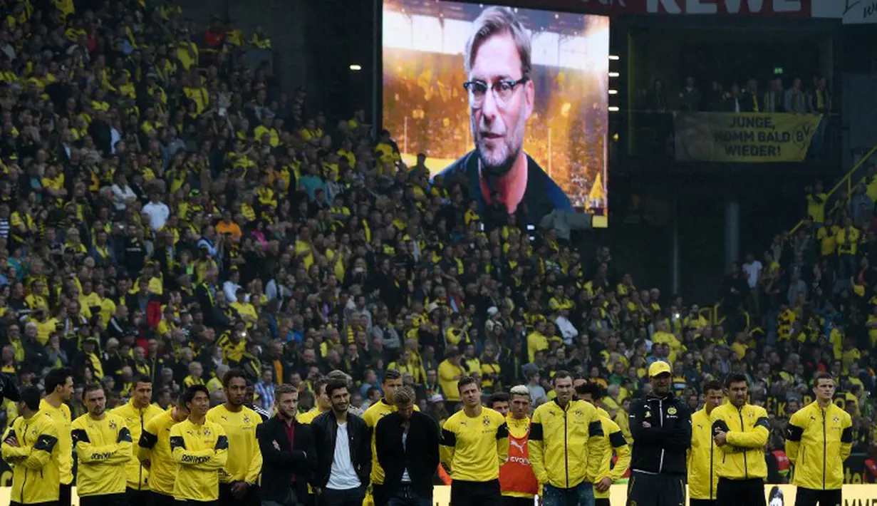 Penggawa Borussia Dortmund berhasil mempersembahkan kemenangan di laga terakhir Juergen Klopp. Die Borussen unggul 3-2 atas Werder Bremen. (PATRIK STOLLARZ/AFP)