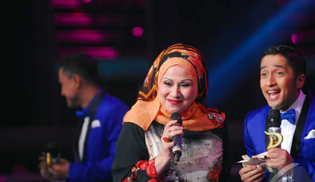 Pada konser Grand Final D'Academy, Camelia Malik mendendangkan lagu yang dipopulerkan sendiri olehnya, Segudang Rindu, Jakarta, Jumat (30/5/2014) (Liputan6.com/Miftahul Hayat).
