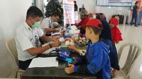 Sejumlah penumpang memeriksakan diri di fasilitas pelayanan kesehatan gratis KAI di Stasiun Besar Purwokerto, Jawa Tengah. (Foto: Liputan6.com/KAI Daop 5/Muhamad Ridlo)