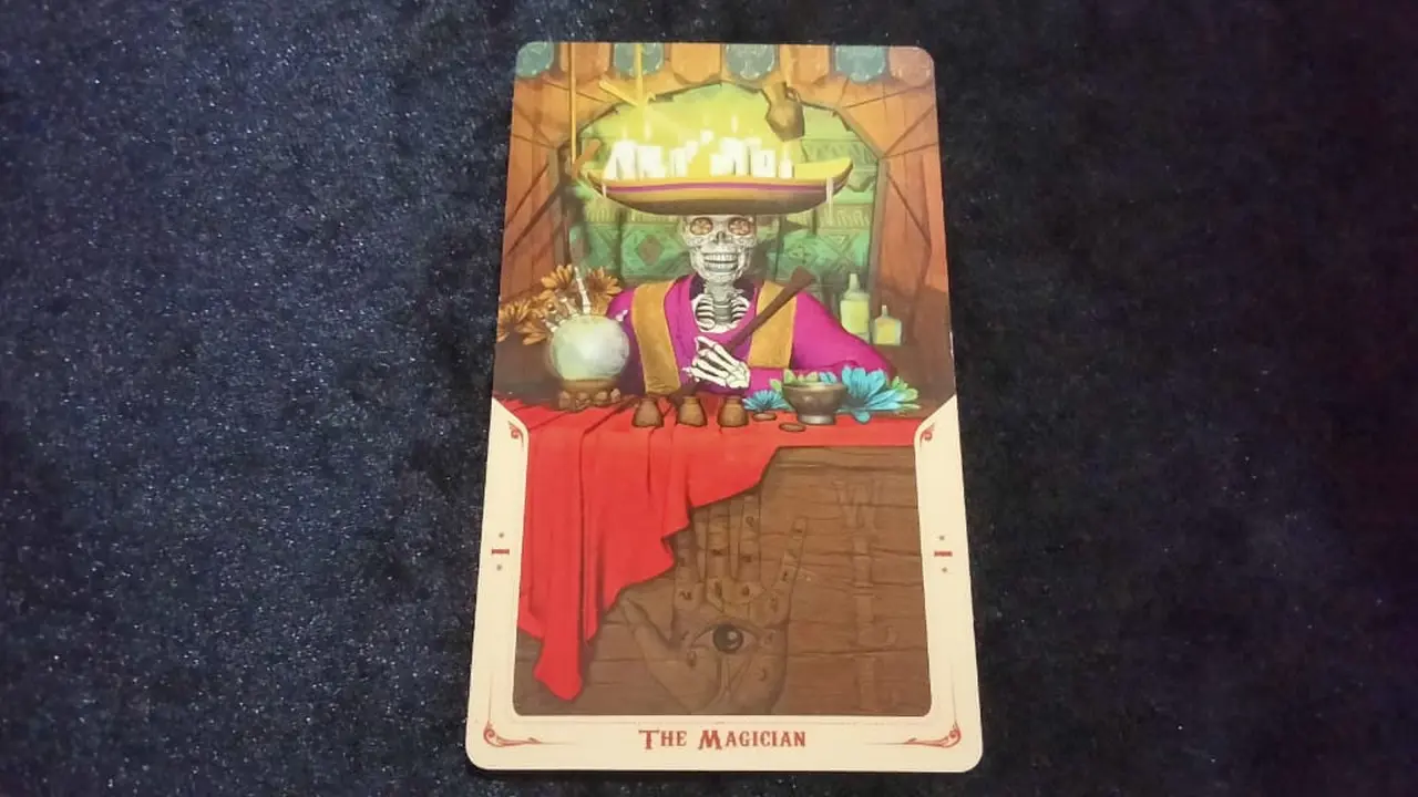 The Magician, kartu tarot yang terbuka.