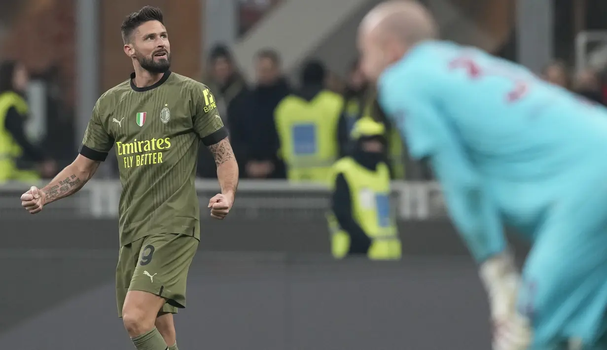 Selebrasi pemain AC Milan, Olivier Giroud setelah berhasil menjebol gawang Torino dalam duel pekan ke-22 Liga Italia 2022/2023, Sabtu (11/2/2023) dini hari WIB. (AP Photo/Antonio Calanni)