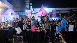 Kegembiraan juga sangat terasa di acara Roaring Night Tri. Selebrasi dilakukan oleh Manchester City Supporters Club Indonesia (MCSCI) Chapter Jambi untuk merayakan kemenangan klub kesayangan secara bersama-sama di depan suporter United Indonesia Jambi. (Istimewa)
