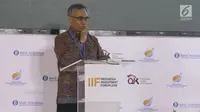 Ketua OJK Wimboh Santoso memberi sambutan dalam Indonesia Investmen Forum (IIF) 2018 di IMF-World Bank 2018 di Bali, Selasa (9/10). Acara tersebut mendiskusikan paradigma baru dalam pembiayaan infrastruktur. (Liputan6.com/Angga Yuniar)