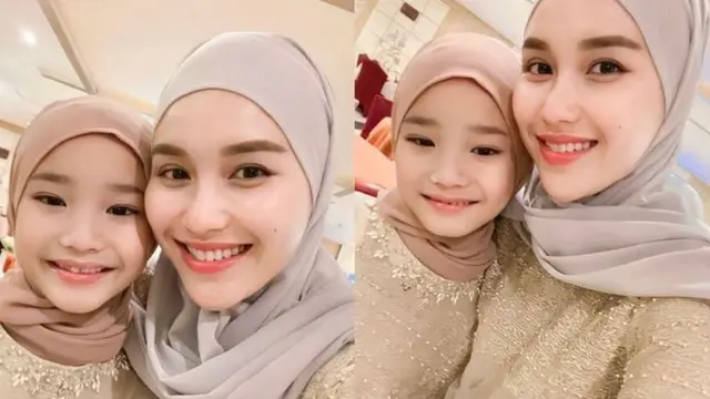 Ayu Ting Ting memakai Hijab dan Busana kembar dengan putriny ayang kali itu bernada Kalem