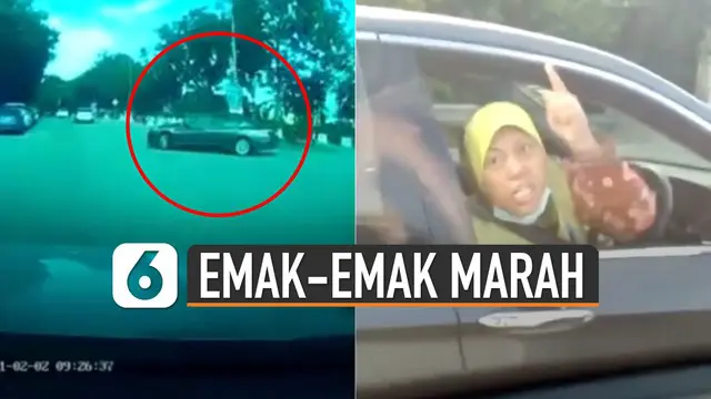 Ketegangan berlanjut, ibu-ibu pengendara sedan hitam meneriaki di lampu merah.