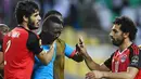 Pemain Mesir menghibur Kiper Burkina Faso, Herve Kouakou Koffi yang menangis usai kalah adu penalti dalam Semifinal Piala Afrika 2017 di Stade de l'Amitie pada 1 Februari 2017. (AFP PHOTO / GABRIEL Bouys)