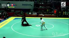 Hanifan Yudani Kusumah menaklukkan andalan Vietnam Thai Linh Nguyen pada final nomor 55-60 kg putra cabor pencak silat Asian Games 2018.