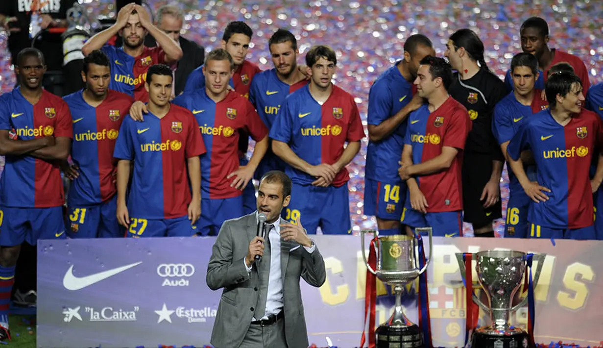 5. Pada musim pertamanya Josep Guardiola berhasil mempersembahkan treble (La Liga, Copa Del Rey dan Piala Champions). Debut yang sensasional bagi seorang pelatih baru. (AFP/Lluis Gene)
