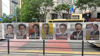 Baliho yang menampilkan para kandidat calon presiden Korea Selatan jelang pemilu pada 3 Juni 2025. (Liputan6.com/Benedikta Miranti)
