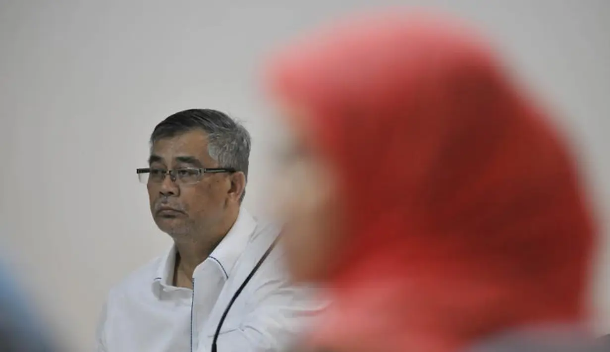 Akil Mochtar kembali menjalani persidangan di Pengadilan Tipikor, Senin (17/03/14) (Liputan6.com/Johan Tallo)