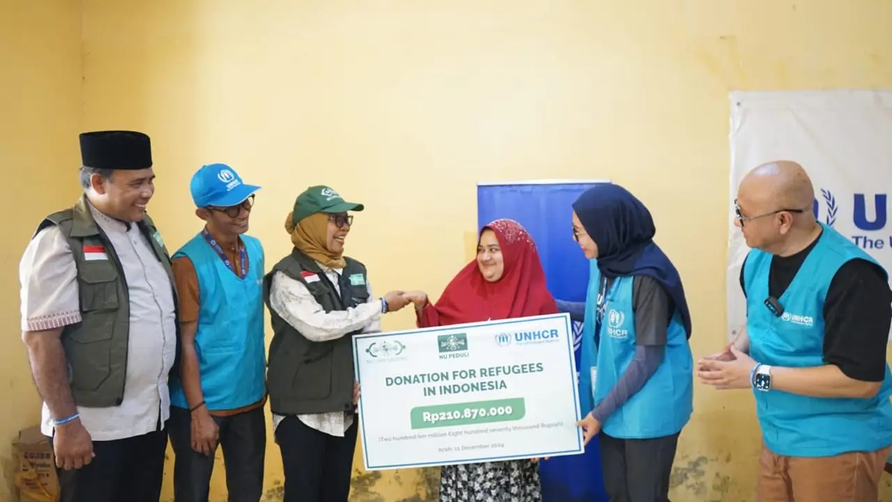 NU Care-LAZISNU menggandeng UNHCR Indonesia dalam komitmen misi kemanusiaannya, untuk menyalurkan bantuan secara langsung kepada para pengungsi Rohingya di Kabupaten Pidie, Aceh, Rabu (11/12/2024) (Istimewa)