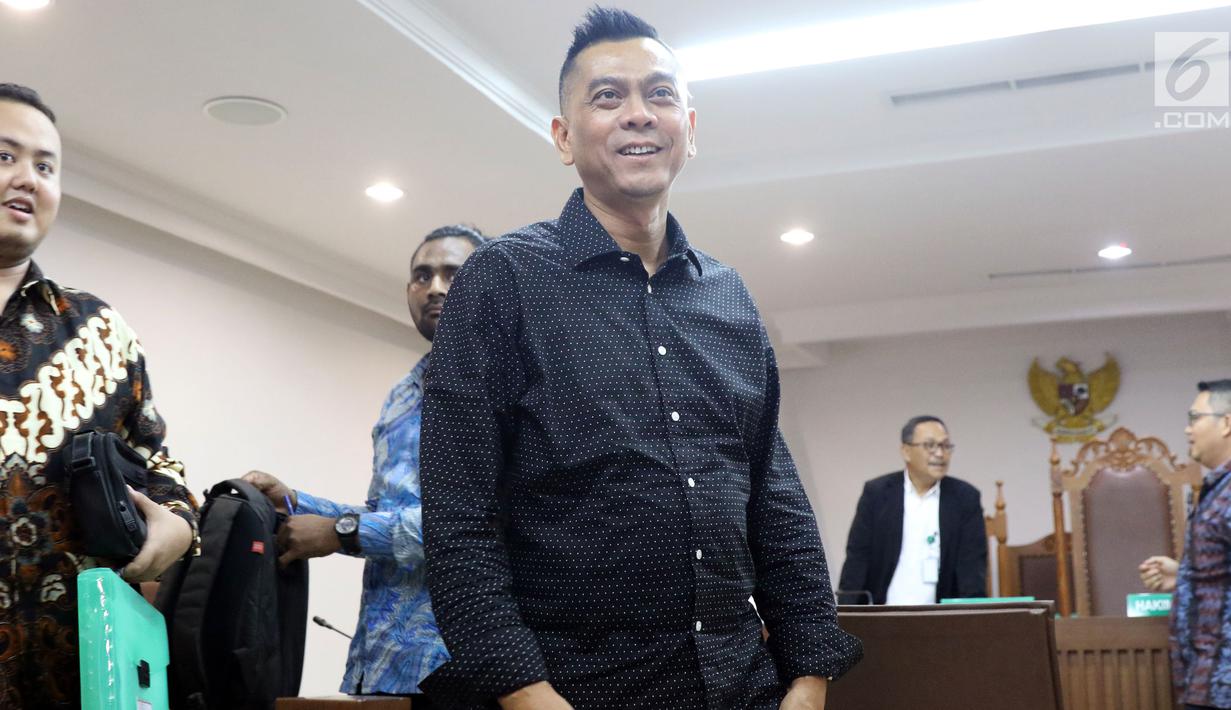 Mantan anggota DPRD DKI Jakarta, Mohamad Sanusi usai menjalani sidang lanjutan Peninjauan Kembali (PK) di PN Jakarta Pusat, Rabu (25/7/2018). Pada persidangan ini kuasa hukum pemohon membacakan kesimpulan pengajuan PK. (Liputan6.com/Helmi Fithriansyah)