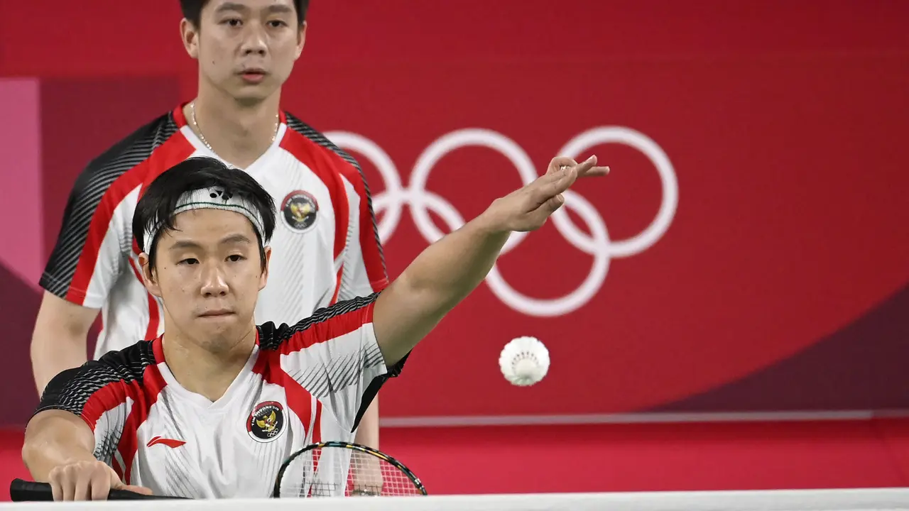 Foto: Kalahkan Pasangan India, Marcus/Kevin Melaju ke Babak Perempatfinal Bulu Tangkis Ganda Putra Olimpiade Tokyo 2020
