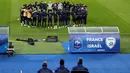 Para pemain Prancis mengheningkan cipta selama satu menit untuk mengenang para korban serangan 13 November 2015 menjelang sesi latihan di Stade de France, di Saint-Denis, sebelah utara Paris, pada Rabu 13 November 2024. (FRANCK FIFE/AFP)