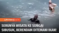 Yang berikutnya masih seputar air, tapi bukan banjir-banjiran. Kami ajak Anda healing sejenak dengan berendam di air sungai yang jernih membiru. Di sini wisatawan bisa berenang.