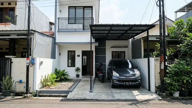 Carport dengan Kanopi Baja Ringan Berwarna Gelap