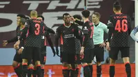 Para pemain Liverpool menyambut gol yang dicetak oleh Georginio Wijnaldum ke gawang Aston Villa pada Babak Ketiga Piala FA 2020/2021, Sabtu (9/1/2021) dini hari WIB. (AP Photo/Rui Vieira)