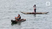 Danau Singkarak terkenal dengan kekayaan ikan bilih yang melimpah. Ikan bilih (mystacoleucus padangensis) merupakan jenis ikan endemik yang hidup di perairan Danau Singkarak dan menjadi salah satu sumber daya alam yang berharga. (Liputan6.com/Angga Yuniar)