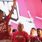Kapten Bali United, Fadil Sausu, saat merayakan gelar juara Liga 1 2019 di Stadion Kapten I Wayan Dipta, Bali, Senin (23/12). Puncak perayaan juara ini dimeriahkan Via Vallen dan Tari Kecak. (Bola.com/Aditya Wany)