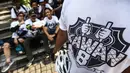 Sejumlah anak muda mengenakan kaos bertuliskan kawan8 saat Car Free Day di Senayan, Jakarta, Minggu (24/7). Mereka mengajak masyarakat untuk #LariBareng8K di sepanjang Jalan Sudirman. (Liputan6.com/Fery Pradolo)