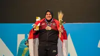 Atlet angkat besi Indonesia Nurul Akmal sukses menyumbangkan tiga medali&nbsp;perunggu&nbsp;kelas 87 kg putri dari total angkatan, snatch, serta clean and jerk, dalam ajang olahraga Islamic Solidarity Games (ISG) 2021 di Konya, Turki. (Foto: Istimewa)