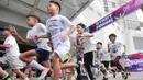 Sejumlah anak mengikuti lomba lari Kids Color Run di Pacific Garden, Alam Sutera, Tangerang, Minggu (9/6/2024). (Bola.com/M Iqbal Ichsan)