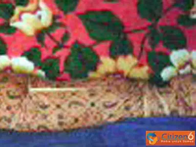 Citizen6, Bogor: Sri Lestari Dwi Aryani (3), balita jika ingin tidur harus di bedong. Jika tidak, Sri balita Desa Citeko, RT01/RW05, Kecamatan Cisarua, Kabupaten Bogor. tidak akan tidur.