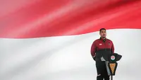 Menteri Pemuda dan Olahraga Republik Indonesia, Ario Bimo Nandito Ariotedjo menyanyikan lagu Indonesia Raya saat pengukuhkan kontingen Indonesia untuk SEA Games 2023 Kamboja yang berlangsung di Kantor Kemenpora, Senayan, Jakarta, Selasa (02/05/2023). Sebanyak 599 atlet akan tampil dalam 31 cabang olahraga. (Bola.com/Bagaskara Lazuardi)