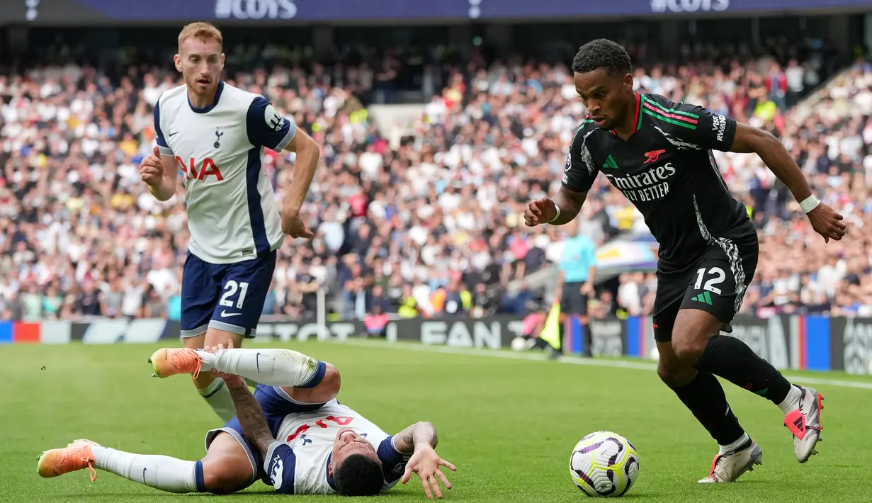 Bermain di markas Tottenham Hotspur, Arsenal unggul 1-0. (AP Photo/Kin Cheung)