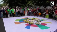 Suksesnya Indonesia dalam gelaran Asian Games di Jakarta dan Palembang, disambut suka cita warga masyarakat Solo, Jawa Tengah.