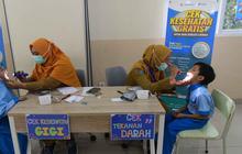 FOTO: Murid SD Antusias Ikuti Pemeriksaan Gratis di Sekolah