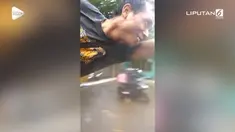 Media sosial dihebohkan dengan aksi kocak Superman yang tiba-tiba muncul di samping angkot.