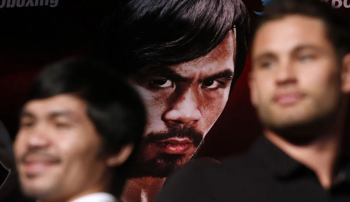 Petinju Filipina, Manny Pacquiao, akan mempertahankan gelar kelas welter WBO melawan Chris Algieri (AS) pada 22 November mendatang, (26/8/2014). (REUTERS/Carlos Barria)