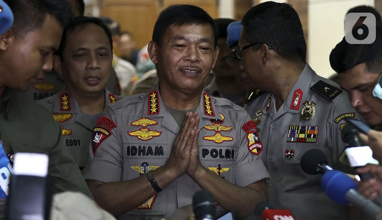 Kapolri Jenderal Polisi Idham Azis usai rapat kerja perdana dengan Komisi III DPR di Kompleks Parlemen, Jakarta, Kamis (30/1/2020). Rapat membahas Rencana Kerja 2020, Tindak lanjut kasus Novel Baswedan, Penanganan Kasus Natuna, Penanganan Kasus Taman Sari dan isu lainnya.(Liputan6.com/Johan Tallo)