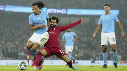 Kejar-mengejar gol terjadi pada laga ini. City tiga kali memimpin masing-masing berkat gol Erling Haaland, Riyad Mahrez, dan Nathan Ake. (AP Photo/Jon Super)