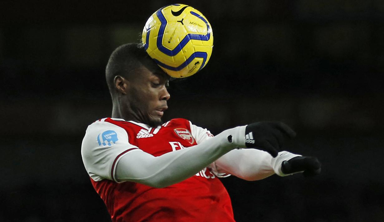 Nicolas Pepe. Sayap merangkap striker Pantai Gading berusia 26 tahun ini didatangkan Arsenal dari Lille pada 1 Agustus 2019 dengan nilai transfer 72 juta pounds. Total 2 musim, ia telah bermain dalam 89 laga di semua kompetisi dengan mencetak 24 gol. (Foto: AFP/Ian Kington)