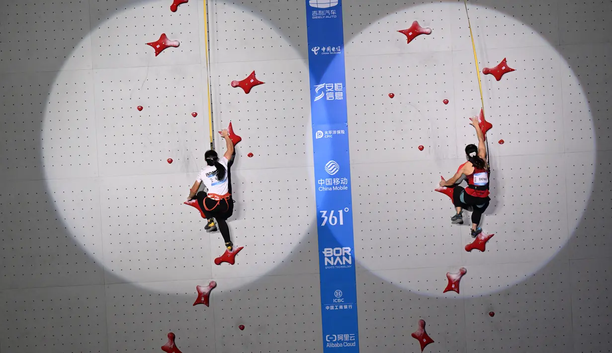 Catatan waktu Desak Made Rita Kusuma Dewi itu memecahkan rekor Asian Games. (ADEK BERRY / AFP)