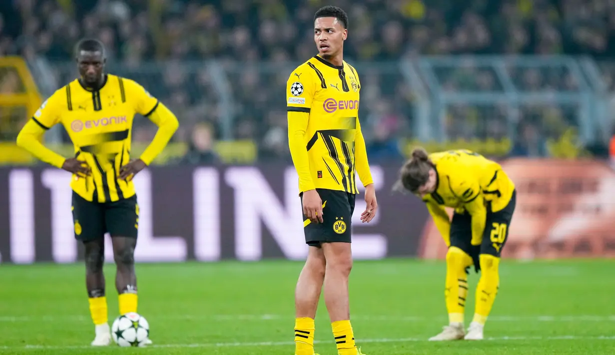 Barcelona sukses meraup tiga poin penting saat bertandang ke markas Borussia Dortmund pada laga Liga Champions. Pertandingan berjalan sengit, Dortmund dua kali mengejar, tapi Blaugrana akhirnya menang dengan skor 3-2. (AP Photo/Martin Meissner)