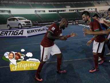 Striker Timnas Indonesia, Boaz Solossa, merayakan gol yang dicetaknya ke gawang Filipina laga Piala AFF 2016 di Philippine Sports Stadium, Filipina, Selasa (22/11/2016). (Bola.com/Nicklas Hanoatubun)