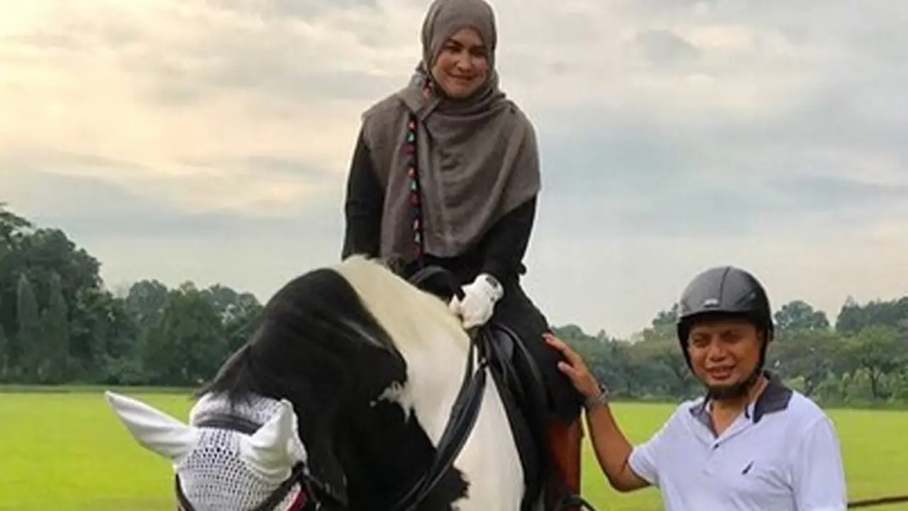 [Bintang] Arifin Ilham dan Istri