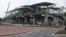 Tampilan salah satu sisi pembangunan Stasiun kereta LRT Velodrome Rawamangun, Jakarta, Selasa (17/7). LRT fase 1 rute Kelapa Gading-Velodrome Rawamangun sepanjang 5,8 kilometer ditargetkan selesai jelang Asian Games 2018. (Liputan6.com/Helmi Fithriansyah)