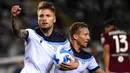 Ciro Immobile. Striker Lazio asal Italia berusia 31 tahun yang kini memasuki musim keenamnya bersama le Aquile telah mencetak 13 gol hingga akhir tahun di Liga Italia. Lazio sendiri hingga kini masih tertahan di posisi ke-8 klasemen sementara Liga Italia. (AFP/Marco Bertorello)