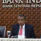 Gubernur BI Perry Warjiyo memberikan penjelasan kepada wartawan di Jakarta, Kamis (20/6/2019). RDG Bank Indonesia 19-20 Juni 2019 memutuskan untuk mempertahankan BI7DRR sebesar 6,00%, suku bunga Deposit Facility sebesar 5,25%, dan suku bunga Lending Facility sebesar 6,75%.(Liputan6.com/Angga Yuniar)