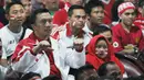 Menteri Pemuda dan Olahraga Imam Nahrawi saat memberi dukungan kepada Timnas Indonesia saat nonton bareng Final Piala AFF 2016 di Kemenpora, Jakarta, (17/12). Final tersebut mempertemukan Indonesia dengan Thailand. (Liputan6.com/Gempur M Surya)