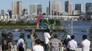 Simbol Paralimpiade "Three Agitos" terlihat dipasang saat wartawan berkumpul di area Odaiba, Tokyo pada Jumat (20/8/2021). Ajang Paralimpiade Tokyo dibuka pada 24 Agustus dalam sebuah upacara yang akan digelar di Stadion Nasional Tokyo. (Yuichi Yamazaki/Pool Photo via AP)
