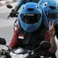 Sejumlah anggota dari komunitas Elmo And Friends berkonvoi menggunakan sepeda motor di kawasan Menteng, Jakarta, Minggu (11/11). Dengan mengenakan batik, mereka melakukan konvoi dalam rangka merayakan Hari Pahlawan. (Merdeka.com/ Iqbal S. Nugroho)