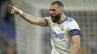 Karim Benzema saat ini sedang menikmati musim paling produktif sebagai seorang penyerang. Pemain asal Prancis itu telah mencetak 43 gol dalam 43 pertandingan di semua kompetisi, termasuk 15 gol di Liga Champions, dimana ia mampu mencetak 10 gol di fase gugur pada musim ini. (AP/Manu Fernandez)