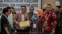 Komisioner KPU Viryan Azis saat proses Rekapitulasi Hasil Penghitungan Perolehan Suara Tingkat Nasional dan Penetapan Hasil Pemilihan Umum Tahun 2019 di Jakarta, Minggu (19/5/2019). Rekapitulasi menetapkan perolehan suara dari Sulawesi Selatan dan PPLN Kuala Lumpur. (Liputan6.com/Faizal Fanani)