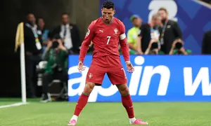 Cristiano Ronaldo rayakan gol di laga Piala Dunia 2026 Portugal vs Uzbekistan. (AFP/Charlotte Wilson)